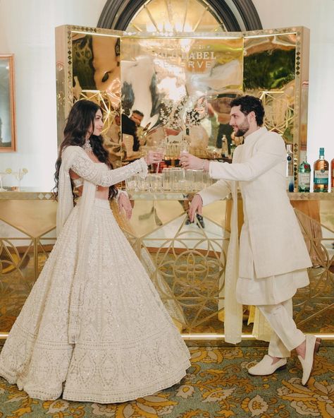 Alanna Panday on Instagram: “Cheers to a new chapter 🥂 Celebration Partner @johnniewalkerindia @jwgoldlabel” Bride And Groom Indian Wedding Outfit, Groom Indian Wedding Outfits, White Bridal Lehenga, Alanna Panday, Indian Wedding Reception Outfits, Wedding Reception Outfit, Bride And Groom Outfits, Couple Wedding Dress, Indian Bride Outfits