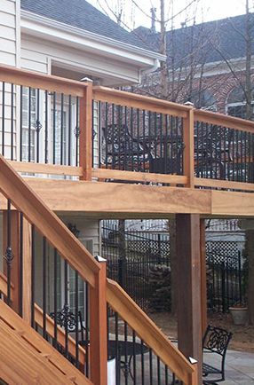 B Wise Contractors Wrought Iron Spindles Front Porch Railing Ideas Wrought Iron And Wood, Wrought Iron Deck Railing Ideas, Rod Iron Deck Railing Ideas, Wrought Iron Deck Railing, Deck Spindles Ideas Railings, Wood Porch Railings, Rod Iron Railing, Deck Styles, Iron Railings Outdoor