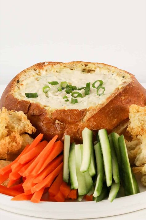 A warm cob loaf hollowed out and filled with french onion dip. Cob Loaf Dip Recipes French Onion, French Onion Cauliflower Bake, French Onion French Dip Garlic Bread, Mini French Onion Bread Bowls, French Onion Cob Loaf, Cob Loaf Dip Recipes, Cob Dip, Cob Loaf Dip, Cob Loaf