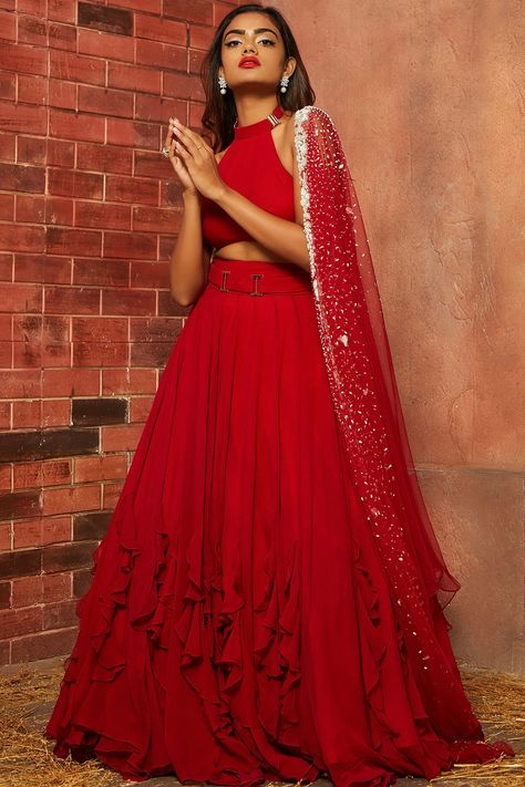 Featuring a red ruffled lehenga in georgette and net base with pearl and beads embellishment. It is paired with a matching crop top and a dupatta.  FIT: Fitted at bust and waist. COMPOSITION: Georgette, Net. CARE: Dry clean only. Shloka Khialani, Ruffle Lehenga, Hand Embellishment, Wedding Wardrobe, Lehnga Dress, Anarkali Gown, Designer Lehenga, Dress Indian, Designer Outfits