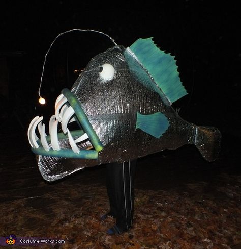 Ivan: I have a tradition of bulky and difficult Halloween costumes and this one certainly fits the bill. The main body is made of an insulating blanket for a hot-water heater... Fish Costume Diy, Angler Fish Costume, Fish Costumes, Fish Costume, Homemade Costume, Costume Works, Homemade Halloween Costumes, Animal Costumes, Homemade Costumes