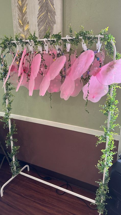 Fairy Wing station for a fairy birthday.  #affiliatelink Fairy First Birthday Party Simple, Disney Fairies Birthday Party, 1st Birthday Girl Fairy Theme, Fairy First Birthday Table Decor, Fairy Wonderland Birthday Party, Woodland Fairy First Birthday, Fairy Birthday Aesthetic, Fairy Birthday Party Ideas Decorations Enchanted Garden, My Fairy First Birthday Decor