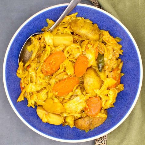 Tikil Gomen (Ethiopian Cabbage with Carrots and Potatoes) - Holy Cow Vegan Tikil Gomen, Vegan Ethiopian Recipes, Ethiopian Cabbage, Cabbage Sauteed, Ethiopian Lentils, Cabbage Curry, Cabbage And Carrots, Cabbage And Potatoes, Carrots Recipe