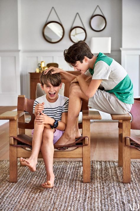 Willem and Henry kid around in a pair of Spanish Chairs designed by Børge Mogensen in 1958. Pilar Guzman, Muji Bed, Chris Mitchell, Spanish Chair, Hampton New York, Black Accent Table, Hampton Home, New York Home, Living Room Reveal