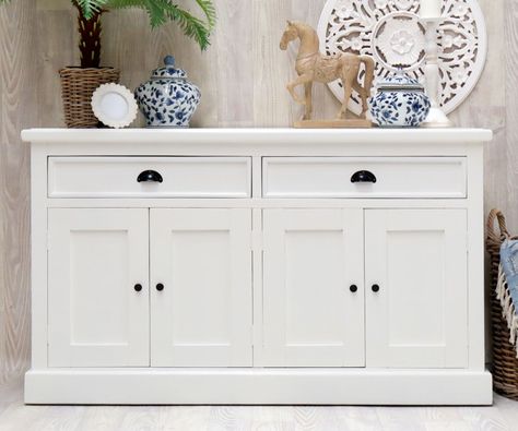 *Note that this is our best estimate based on current advice from the factory. This may change depending on their production schedule but we will keep you informed.This gorgeous large buffet or sideboard brings the best of a classic Hamptons style to your home. It features two generous drawers with classic black metal cup handles, and four doors below.Made from hardwood this piece has a lovely fresh white painted finish.Measures 145cm long, 85cm tall and 50cm deep. Features two drawers and four White Buffet Table, White Buffet Cabinet, White Sideboard Buffet, Hamptons Style Decor, Buffet Makeover, Sideboard White, White Buffet, Painted Buffet, Buffet Decor