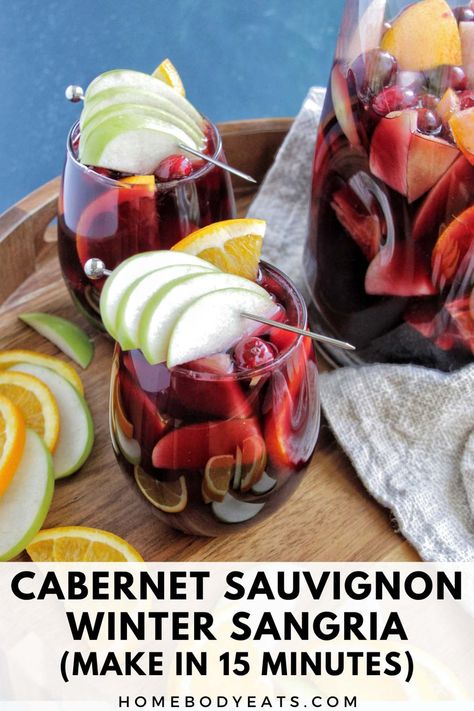 This red wine cabernet sauvignon sangria recipe is simple and full of delicious flavors. With hints of apple cider, orange, and cranberry, this sangria would be perfect for any fall or winter celebrations (Thanksgiving, Christmas, or holiday party). Add in a splash of brandy for an extra kick of warmth. This is the best easy cocktail for a crowd! Cabernet Sauvignon Sangria, Holiday Cocktails Thanksgiving, Cocktail For A Crowd, Winter Sangria Recipes, Wine Thanksgiving, Christmas Sangria Recipes, Thanksgiving Sangria, Orange And Cranberry, Sangria Pitcher