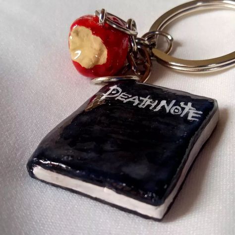 A little piece of the Shinigami realm, a must-have for anime fans. Can you guess the anime? 🖤🖋️ . . . #deathnote #anime #keychaincollectibles #deathnoteanime #clay #diy #miniature Clay Apple, Deathnote Anime, Guess The Anime, Clay Keychain, Diy Origami, Clay Ideas, Diy Art, Origami, Miniatures