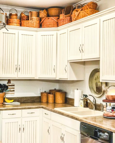 How I decorate my home with baskets Baskets Above Kitchen Cabinets, Decorating With Longaberger, Longaberger Basket Ideas, Decorate With Baskets, Top Of Kitchen Cabinets, Top Of Cabinets, Longaberger Baskets, Above Kitchen Cabinets, Above Cabinets