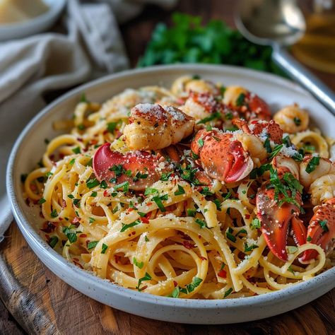 Lobster Linguine Ingredients: 500g linguine pasta 2 whole lobsters or 500g lobster meat (claws and tails) 4 tbsp unsalted butter 3 cloves garlic, minced 1 shallot, finely chopped 1/2 cup dry white wine 1 cup heavy cream Zest and juice of 1 lemon 1/2 cup grated Parmesan cheese Salt and pepper to taste 1/4 cup fresh parsley, chopped 1/4 tsp red pepper flakes (optional, for a bit of heat) #LobsterLinguine #SeafoodPasta #ItalianCuisine #GourmetPasta #HerbedFork #DeliciousDishes #EasyRecipes #Fan... Lobster Tagliatelle, Lobster Linguine, Lobster Pasta, Gourmet Pasta, Linguine Recipes, Linguine Pasta, Lobster Meat, Shrimp Recipes Easy, Seafood Pasta