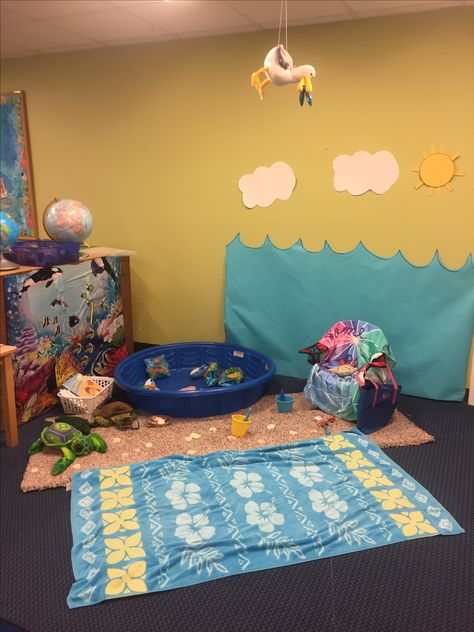 Beach Dramatic play center! Water Study Creative Curriculum Dramatic Play, Beach Theme Dramatic Play, Ocean Themed Dramatic Play Center, Ocean Theme Preschool Dramatic Play, Beach Theme Dramatic Play Preschool, Water Dramatic Play Ideas, Beach Dramatic Play Preschool, Ocean Dramatic Play Preschool, Under The Sea Dramatic Play