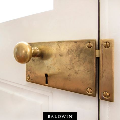 Our Horizontal Rim Lock in Vintage Brass adds a rustic look to this creole style home. Credit: J.E. Schram Architect Baldwin Hardware, Traditional Interior Design, Doors And Hardware, Up House, Home Hardware, Style Home, Helpful Tips, Door Knobs, Rustic Home Decor