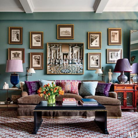 Blue-Green Painted Room Inspiration | Architectural Digest In interior decorator Alexa Hampton’s Manhattan family room, a wall painted a Farrow & Ball blue hosts images of architectural elements, framed by J.Pocker, and a Massimo Listri photograph; the rug is by Stark. Green Painted Rooms, Blue Green Rooms, Purple Rooms, Celebrity Homes, Design Del Prodotto, Green Rooms, A Living Room, Restoration Hardware, Architectural Digest