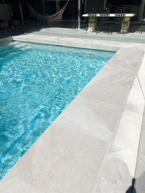 Grey Pool Liner, Grey Pool Pavers, Grey Plaster Pool, Grey Travertine Pool Deck, Pool Decking Concrete, Waterline Pool Tile, Bluestone Coping Pool, Pool Patio Designs, Decks Around Pools