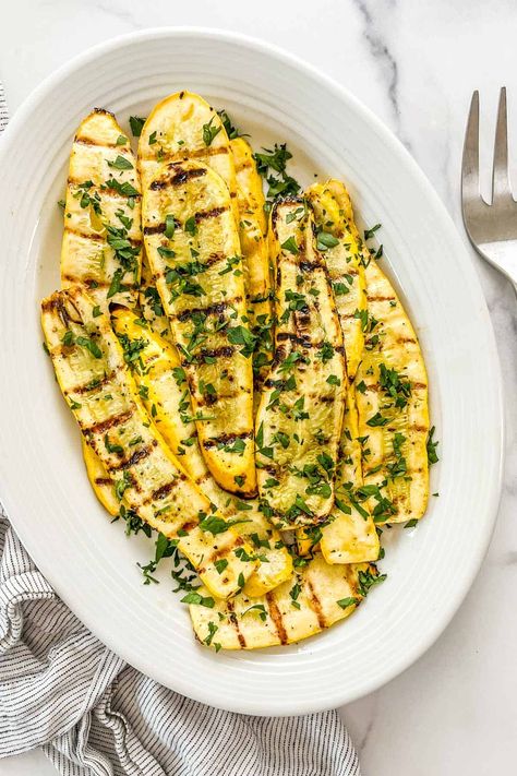 This delicious grilled summer squash recipe is the perfect summer side dish! Grilling yellow squash brings out the natural sweetness and adds a lovely smokey char as well. Recipes For Squash, Grilled Yellow Squash, Squash Grilled, Yellow Squash Recipe, Summer Squash Recipes, Yellow Squash Recipes, Summer Side Dish, Squash Recipe, Summer Side Dishes