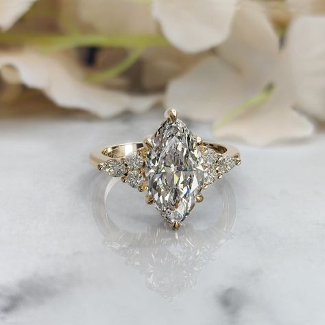 𝐒𝐭𝐨𝐧𝐞 : 𝐋𝐚𝐛 𝐆𝐫𝐨𝐰𝐧 𝐃𝐢𝐚𝐦𝐨𝐧𝐝 (𝐈𝐆𝐈 𝐂𝐞𝐫𝐭𝐢𝐟𝐢𝐞𝐝 ) →Shape: Marquise Cut  →Weight: 2.00 Carat  →Color: F →Clarity : VS1 →Polish/Symmetry - Ex/Ex →Fluorescence - None →Side Accent Diamond Shape: Round & Marquise Cut →Side Accent Diamond Weight: 0.62 Ct 𝐌𝐞𝐭𝐚𝐥 𝐓𝐲𝐩𝐞:  925 Sterling Silver  Solid 14K/18K Gold 950 Platinum 𝐖𝐡𝐚𝐭 𝐖𝐢𝐥𝐥 𝐘𝐨𝐮 𝐆𝐞𝐭 ? ●Your Dream Ring. ●Beautiful Ring Box. ●Free Engraving. ●Original IGI Certificate. ~ ɪꜰ ʏᴏᴜ ᴡᴏᴜʟᴅ ʟɪᴋᴇ ᴛᴏ ᴠɪᴇᴡ ᴛʜᴇ ᴄ Propose Ring, Cute Engagement Rings, Marquise Ring, Engagement Rings Marquise, Pave Engagement Ring, Dream Engagement, Dream Engagement Rings, Round Diamond Engagement Rings, Payment Plan