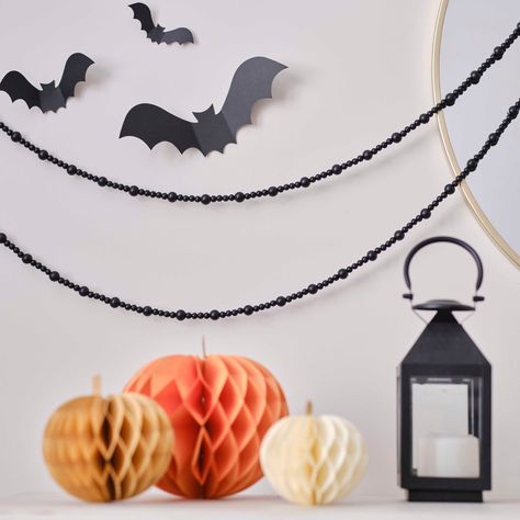 Add the final touch to your spooky theme with this black wooden bead Halloween garland. Bring a touch of class to your Halloween decorations with our beaded Halloween banner, perfect to add to your mantelpiece, above your table, or around the house for your Halloween dinner party. Pair with other decorations from our Deadly Soiree collection to complete your spooky look. Each pack contains: 1 x wooden beaded garland, 3m (L) Scandi Halloween Decor, Beaded Halloween, Halloween Dinner Party, Halloween Girlande, Halloween Bunting, Halloween Party Dinner, Halloween Garland, Wooden Bead Garland, Halloween Beads