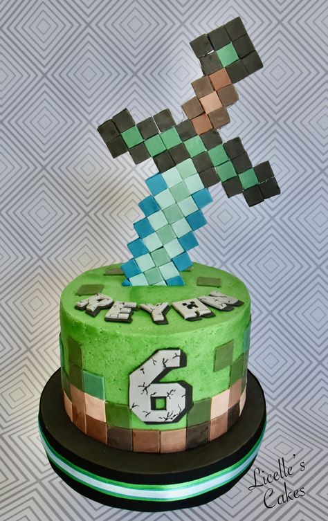 A buttercream minecraft cake based on a Cake street cake. The sword is a fondant covered ruler. Minecraft Buttercream Cake, Minecraft Cake Buttercream, Mindcraft Cakes Birthday Boys, Minecraft Cakes, Minecraft Dort, Pastel Minecraft, Minecraft Cake Designs, 9th Birthday Cake, Roblox Cake