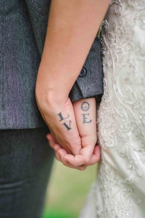 LOVE wedding tattoo | Texas Traditional Villa Lesbian Wedding | Equally Wed - LGBTQ Weddings Lgbtq Couple Tattoos, Lesbian Matching Tattoos, Lesbian Couple Tattoos, Lesbian Tattoo Ideas Design, Couples Hand Tattoos, Victoria Tattoo, Matching Couple Tattoo, Equality Tattoos, Lesbian Tattoo