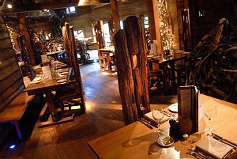 Alnwick_Inside-Treehouse Treehouse Restaurant, Tree House Interior, Alnwick Castle, Wooden Walkways, Rustic Restaurant, Tree House Designs, Magic Treehouse, Gnome House, Built In Bench