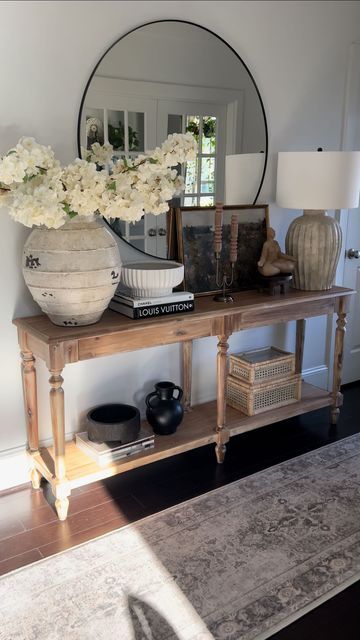 Modern Farmhouse Entry Table Decor, Entryway Table Bottom Shelf Decor, Natural Entryway Decor, How To Style Foyer Table Entryway, Spring Home Styling, Rustic Modern Farmhouse Entryway Table, Entry Way Ideas With Mirror, Entry Table Bottom Shelf Decor, Entry Cabinet Decor