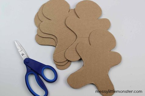 gingerbread man craft Ginger Bread Man Diy, Candy Cane Gingerbread Man, Gingerbread Man Paper Craft, Diy Cardboard Gingerbread Man, Gingerbread Men Crafts, Giant Cardboard Gingerbread Man, Cardboard Gingerbread Ornaments, Gingerbread Man Template, Gingerbread Man Crafts