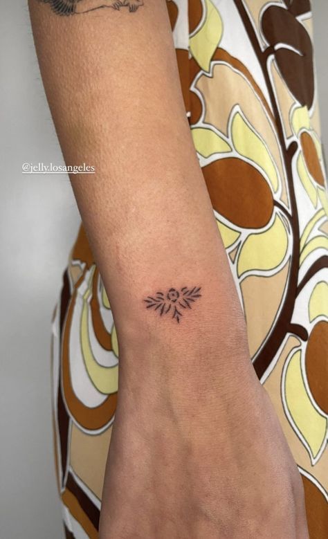 Bottom Shin Tattoo, Front Wrist Tattoos For Women, Accent Tattoos, Scandinavian Tattoo For Women, Upper Wrist Tattoo, Asymmetrical Tattoo, Tiny Floral Tattoo, Top Of Wrist Tattoos, Guatemalan Tattoo