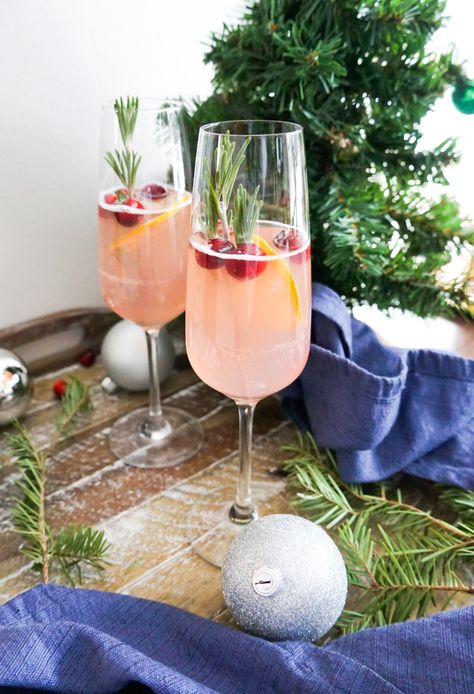 A Mistletoe Kiss (Cranberry French 75) – Al Fresco NWA French 75 Cocktail Christmas, Cranberry Kiss Cocktail, Mistletoe Kiss Cocktail, French 75 Cocktail Holiday, Christmas French 75 Cocktail, Christmas French 75, Holiday French 75 Cocktail, Cranberry French 75, Holiday French 75