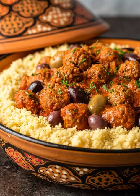 Moroccan meatballs are made with ground meat, onions, and herbs, and served with a flavorful tomato sauce. Pair with olives and couscous! Moroccan Birthday, Moroccan Meatballs, Moroccan Recipes, Moroccan Cooking, Middle East Recipes, Moroccan Dishes, Filling Dinner, Dinner Prep, Global Cuisine