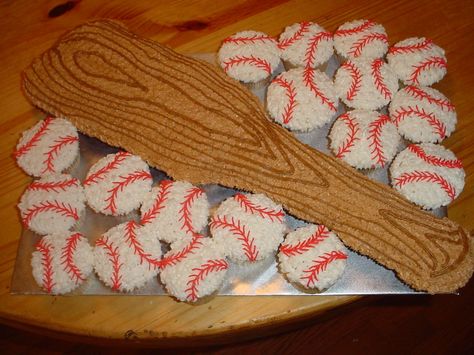 Baseball Bat and Baseball Cupcakes - White and chocolate cupcakes iced with buttercream Baseball Cupcake Cakes, Baseball Pull Apart Cupcakes, Baseball Cupcakes Pull Apart, Baseball Cookies Buttercream, Baseball Bat Cookies Decorated, Baseball Cookie Cake Ideas, Bat Cake, Baseball Birthday Cakes, Baseball Tattoos