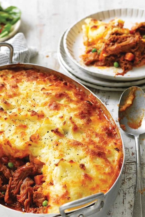 Tray filled with pulled pork filled mixed with peas and carrots served with a mash potato topping. Warm Comfort Food, Pork Pie, Shepherd's Pie, Shepherds Pie, Yellow Onion, Pie Recipe, Tomato Paste, Pulled Pork, Dinner Time