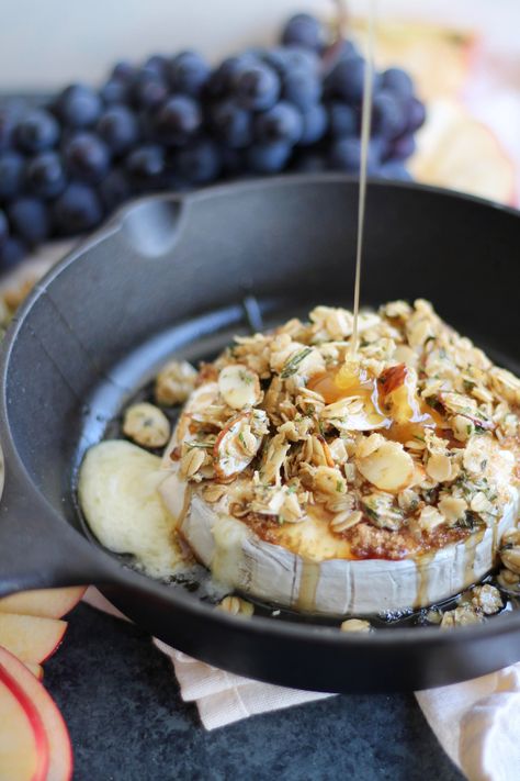 I know what you’re thinking. “Granola and brie?!…and this seems like a fall/winter appetizer.” You gotta trust me on this one though. This combo is AMAZING and so worth the 12-15 minutes your oven has to be on. I’m all about the fresh fruit and cheese combos during the summer, but it’s always fun to … Baked Brie With Honey, Brie With Honey, Baked Brie Honey, Winter Appetizers, Savory Granola, Baked Brie Recipes, Brie Recipes, Baked Brie, Enchanted Garden