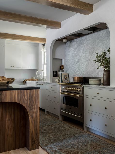 Everything you need to know before buying a beautiful nostalgic Italian range. Learn the features, pros and cons, and more in this guide. Large Kitchen Hood Ideas, Yond Interiors, Kitchen Niche, Walnut Island, Sleek Cabinet, Kitchen Hoods, Vent Hood, Pantry Design, Kitchen Trends