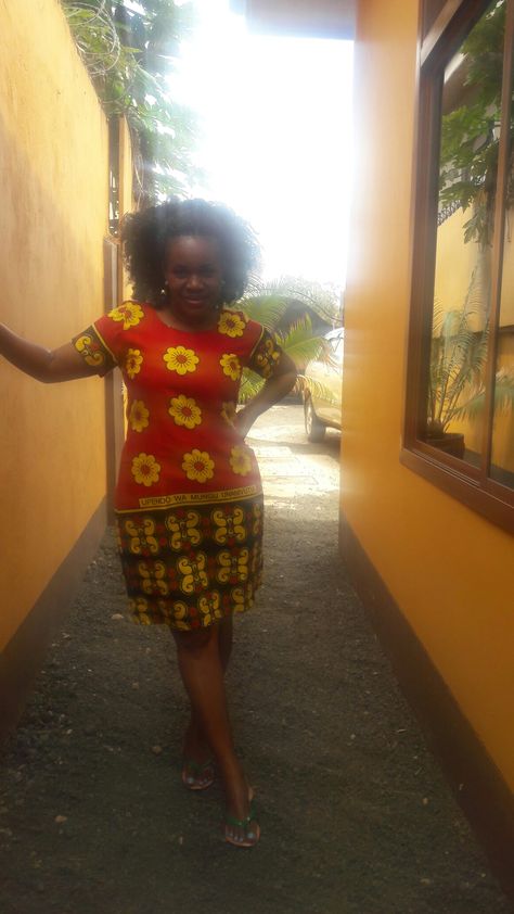 Kanga casual dress Kanga Dress Designs, Kenyan Clothes, Ankara Design, Ankara Outfits, Kitenge Designs, African Attire Dresses, Long African Dresses, African Outfits, Ankara Designs