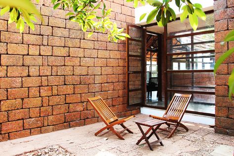 Indian Courtyard, tropical living, laterite stone walls, Vrindavan, by unTAG Exterior Stone Wall Design, Laterite Stone, Grey Stone House, French Stone House, Small Stone House, Stone Exterior Houses, House Mediterranean, Exterior Wall Cladding, Stone Wall Design