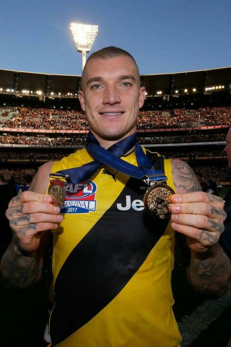 Dustin Martin with premiership medallion and Norm Smith Medal Richmond Afl, Dustin Martin, Richmond Football Club, Im Falling In Love, Sports Hero, Falling In Love Again, Pro Cycling, Heavy Metal Bands, Love Ya