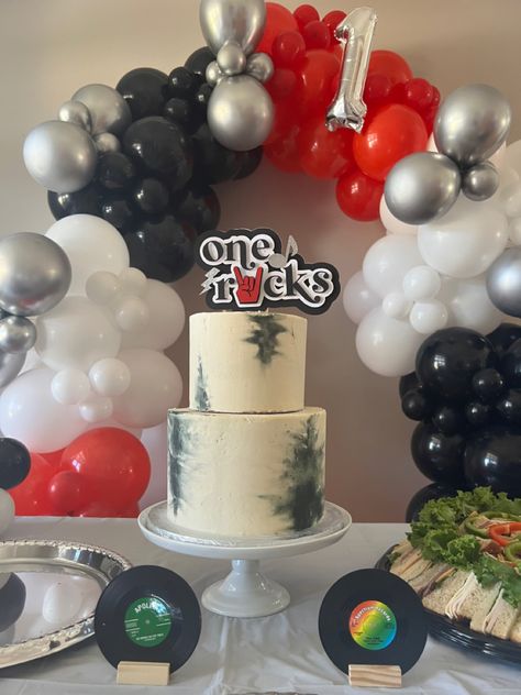 Rock And Roll Party Balloon Arch, Rock N Roll First Birthday Cake, Rocker 1st Birthday, One Rocks First Birthday Photoshoot, Rock N Roll Cake Ideas, Rocked My First Year Birthday, Rock And Roll Dessert Table, One Rocks First Birthday Smash Cake, Metallica One Birthday