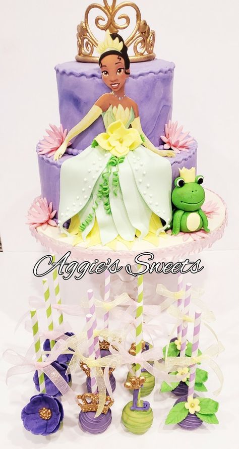 Princess Tiana cake and cake pops Princess Tiana Cake Pops, Princess Tiana Cake Ideas, Tiana Cake, Princess Tiana Birthday Cake, Disney Princess Party Decorations, Princess Tiana Party, Princess Tiana Birthday Party, Tiana Birthday Party, Frog Baby Showers