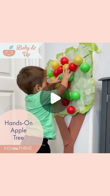 Megan | Kids Activities, Recipes, Hacks on Instagram: "🍎 🍏 You have to try this toddler favorite! 🍏 🍎   First, I made a big apple tree out of construction paper. (If you look closely, you can see I first tried to use contact paper, but it wasn’t sticky enough. More on that another day!) Then I covered the tree with green painters tape, sticky side out. I secured all the corners with more tape. The painters tape was the PERFECT amount of stickiness for the ball pit balls. My toddler had a blast “picking apples” then putting them back on. He did this all afternoon and evening! We then practiced some color recognition and counting.   If you’re going to try any toddler activity this week, this is the one!   #toddleractivities #toddlers #applepicking #fall #preschool #preschoolactivities #p Pin The Apple On The Tree Game, Apple Tree Craft For Toddlers, Apple Picking Activity For Toddlers, Contact Paper Toddler Activities, Tree Day Activities For Kids, Tree Out Of Construction Paper, Apple Day Activities For Kids, Toddler Apple Activities, Apple Activities For Toddlers