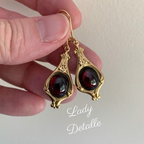 "Tiny real GARNET Edwardian Earrings, Historic Reproduction Edwardian 16k gold or Silver plated lever backs real GARNET stone small earrings This listing is for a pair of reproduction early 20th century EDWARDIAN design earrings, created with gorgeous real GARNETs, set in a historic and classical design (hollow back), finished with 16K gold or Silver plated brass Lever backs. I simply adore this classic small Edwardian design: perfect for Edwardian, Titanic and Downton Abbey, as well as late Vic Edwardian Earrings, October Jewelry, Ethereal Jewelry, Edwardian Jewelry, Historical Jewellery, Royal Dresses, Garnet Jewelry, Garnet Earrings, Funky Jewelry