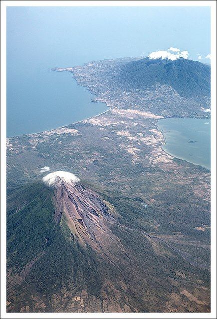 Aerial view of volcanoes #Concepción and #Maderas in #Ometepe Island Lake #Nicaragua. Ometepe is 276 km² (106.6 mi ²) in length and is the world's largest island in a freshwater lake.  Espectacular vista aérea de los volcanes Concepción y Maderas en la isla de Ometepe del Gran Lago de Nicaragua, su extensión es de 276 km² y es la isla más grande del mundo dentro de un lago de agua dulce. Lake Nicaragua, Ometepe, Nicaragua Travel, Island Lake, Central America Travel, Natural Element, Panama City Panama, Central America, America Travel