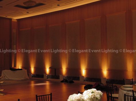 Amber Uplighting provides a warm, inviting environment for wedding guests. Petals Aisle, Turquoise Wedding Decorations, Beulah Land, Reception Lighting, Uplighting Wedding, Aisle Decorations, Wedding Guest Outfit Winter, Romantic Wedding Receptions, Silk Rose Petals