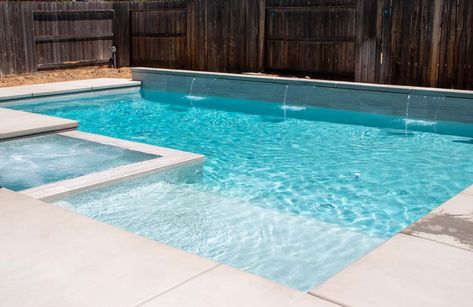 Small Pool With Tanning Ledge And Hot Tub, In Ground Pool With Tanning Ledge, Pool With Sun Shelf And Spa, Swimming Pool With Tanning Ledge, Liner Pool With Hot Tub, Geometric Pool Designs With Spa And Tanning Ledge, Pool Landing Ideas, Simple Pool Water Feature, Gunite Pool Ideas With Tanning Ledge