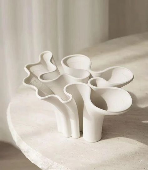 FREE SHIPPING WORLDWIDE
HANDCRAFTED








ABOUT





Enhance your living space with the Paloma Vase, an exquisite design inspired by the fluid, abstract forms of coral and seashells. Its flowing shapes bring a hint of natural beauty to your home, serving as an enchanting centerpiece. This adaptable vase looks stunning with bright orchids or on its own, radiating timeless appeal with its subtle finish. Opt for the Paloma Vase to perfect your decor and make a striking addition to your surroundings today.


SHIPPING & RETURNS







Free Shipping: Complimentary Shipping 

Returns: Not satisfied? We accept returns for most items within 14 days of receiving them for a refund or store credit.

















DIMENSIONS







Size: 30 cm x 19.5 cm x 13.5 cm (1.8 in x 7.7 in x 5.3 in)

 Note Coral Vase Ceramics, Ceramic Photo Stand, Feminine Ceramics, Coral Vase, 3d Vase, Shower Cabinets, Coral Table, Beautiful Ceramics, Abstract Beauty