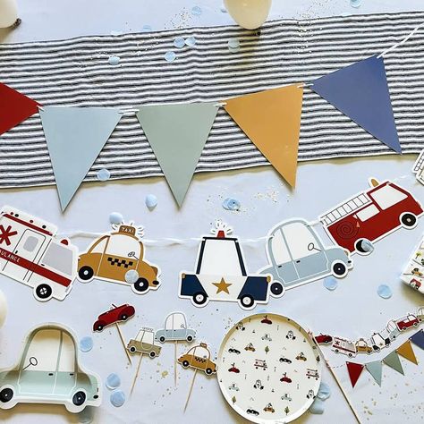 This vibrant banner is perfect for any little speedster's birthday celebration. With its transportation theme and adorable vehicle illustrations, it's sure to bring a fun and festive atmosphere to your party. Featuring firetrucks, taxis, and police cars, this banner will have your little one and their friends saying "vroom vroom!" in excitement. Designed by Josi James Want to see more Construction, Car and Truck Themed Party Supplies? Want to see more Sports Party Supplies? Vintage Car Party, Auto Party, Transportation Birthday Party, Transportation Party, Transportation Birthday, Car Banner, Car Themed Parties, Cars Theme Birthday Party, Cake Banner