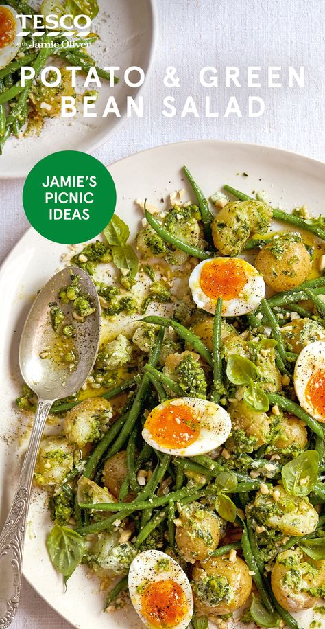 Jamie Oliver says "When the sun shines, pack up a picnic and head to the closest patch of grass with this next-level potato salad, featuring green beans for an extra hit of veg. Simply get everything boiling while you bash up the almond pesto, then bring it all together. It couldn't be easier." | Tesco Jamie Oliver Potatoes, Potato And Green Bean Salad, Potato And Green Bean, Almond Pesto, Green Bean Salad, Tesco Real Food, Green Bean Salads, Jamie Oliver Recipes, Potatoe Salad Recipe