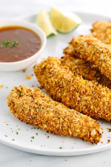 Baked Chicken Tenders with Cereal Flakes - The ultimate meal that the whole family will enjoy! Each bite is coated with crispy Honey Bunches of Oats cereal, coconut, and served with orange sauce. | jessicagavin.com #CerealAnytime #CollectiveBias Oat Crusted Chicken Tenders, Chicken Tenders With Bread Crumbs, Cereal Crusted Chicken Tenders, Lightly Breaded Chicken Tenders, Crunchy Chicken Tenders, Baked Chicken Tenders, Healthy Meal Delivery Service, Chicken Tender Recipes, Healthy Food Delivery