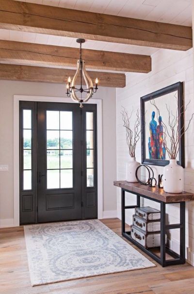 Entry Door Ideas, Black Entry Doors, Rustic Foyer, Log Home Interior, Black Exterior Doors, Rustic Entry, Front Entry Door, Foyer Ideas, Wooden Console