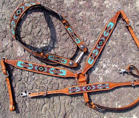 Showman® Argentina Cow Leather Headstall and breast collar set with aztec beaded inlay. This set features medium oil leather turquoise, brown, and burgundy navajo beaded inlay. Leather is accented with minimal tooling and has brushed nickle conchos on headstall.  Set includes browband headstall, breastcollar and matching wither strap. Western Horse Tack Turquoise, Western Riding Tack, Horse Braids, Barrel Racing Tack Sets, Barrel Racing Tack Rodeo, Bling Horse Tack, Barrel Racing Saddles, Cowboy Life, Western Horse Saddles