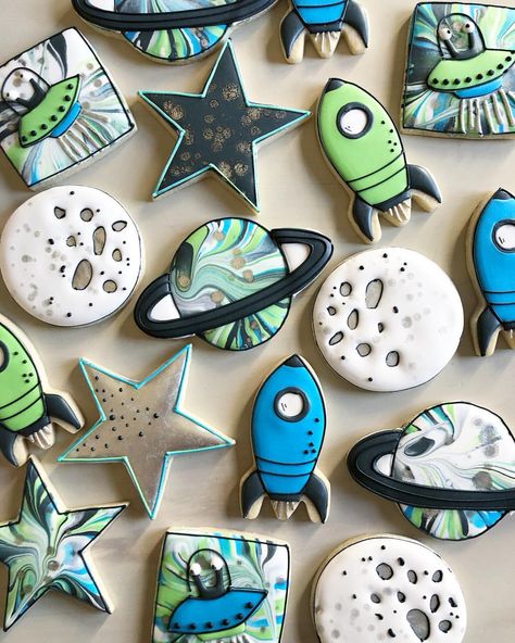 Space cookies; decorated cookies l; birthday party cookies; royal icing; rocket ships; stars; planets; moon cookies