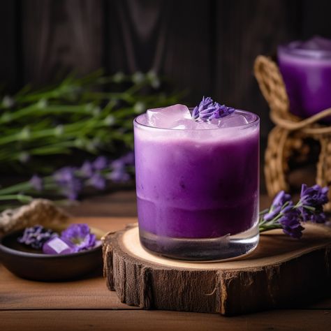 This vibrant and refreshing cocktail combines ube, also known as purple sweet potato, with coconut milk and a hint of lime for the perfect tropical sipper. #drinkinspiration #easyrecipe #caribbean #tasty #weeknightdinner #philippines #recipeinspiration #ubecocktail #happyhour #savory #yum #coconutlime #food #purplebliss #brunchgoals Cocktails With Ube, Ube Cocktail Recipe, Coconut Milk Cocktail, Fruity Alcohol Drinks, Sweet Potato Smoothie, Boozy Popsicles, Ube Recipes, Purple Cocktails, Purple Sweet Potato